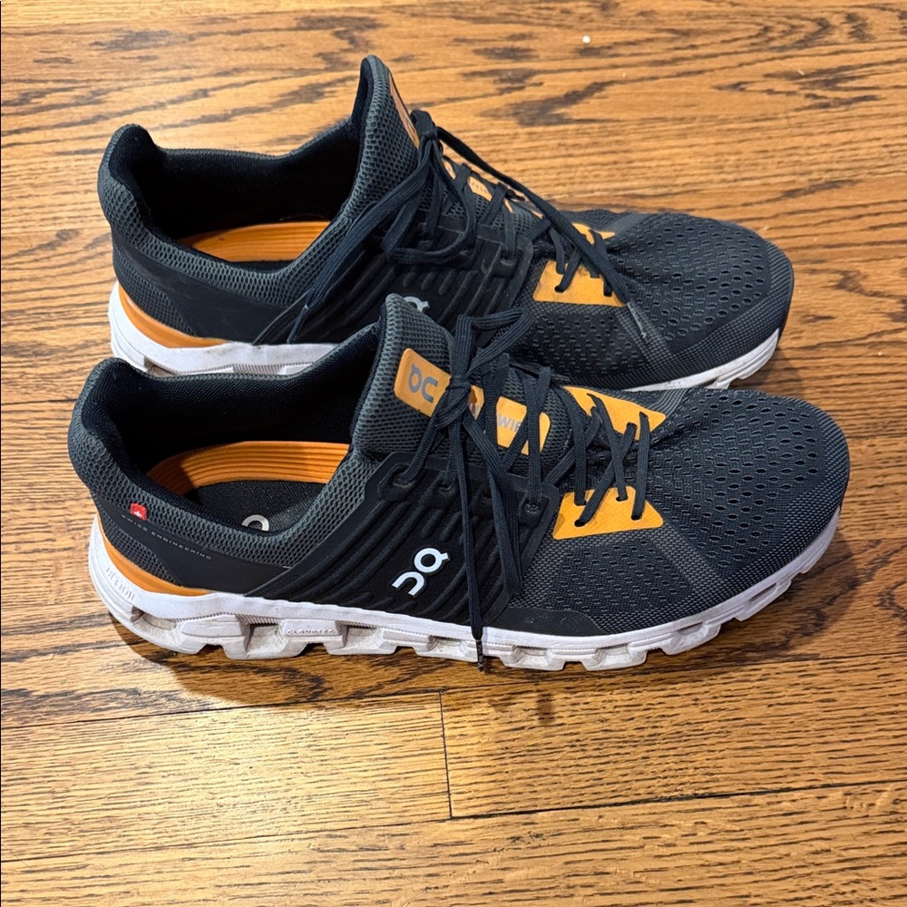 On Running Men's Black and Orange Athletic Shoes